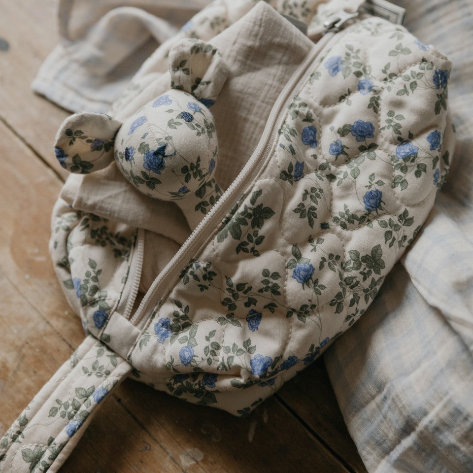 Toiletry bag and rattle in flower pattern